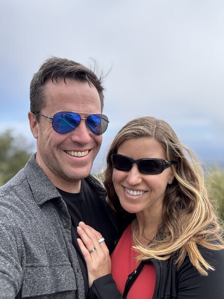 Rebecca and David Weekly standing together